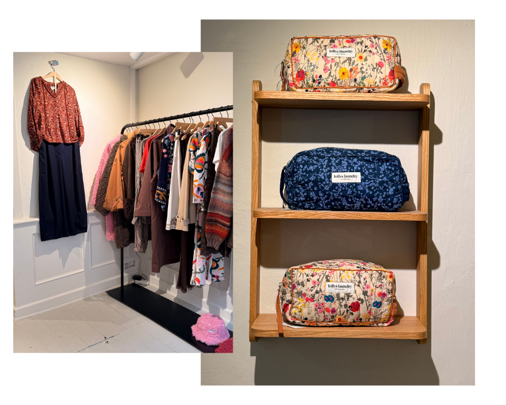 Lollys Laundry butik i Aarhus med toilettasker i forskellige farver og farverigt tøj på tøjstativer.